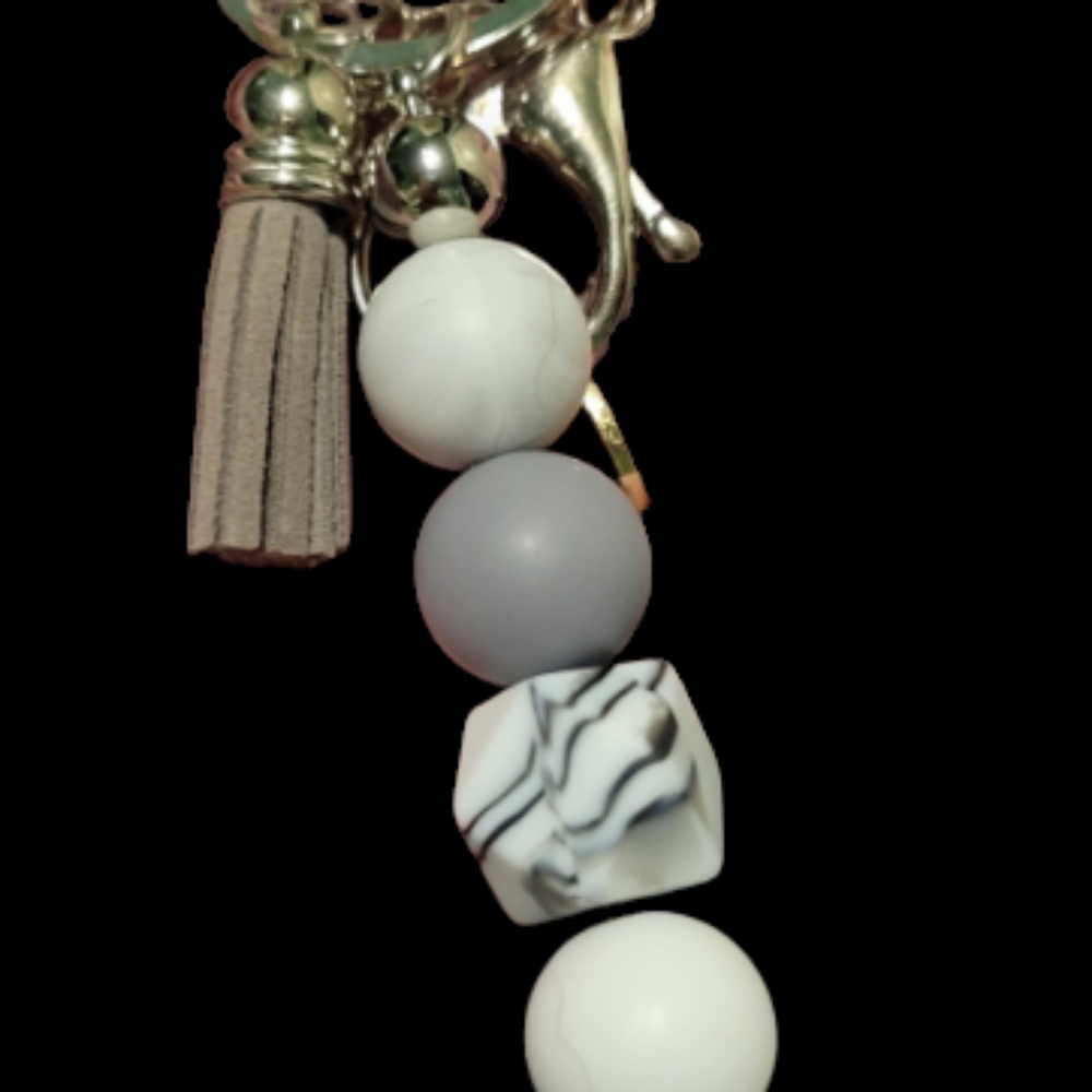 Grey keychain with tassel